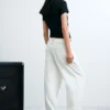 Pantaloni larghi con bottoni
