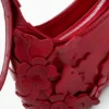 Borsa piccola con applicazioni floreali