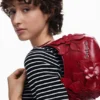 Borsa piccola con applicazioni floreali