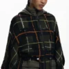 Poncho a quadri con cappuccio imbottito