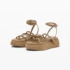 Sandali con zeppa in pelle