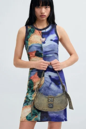 Shorts con spalline stampato