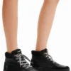 Sneaker alta in finta pelle di montone Sneaker alta in finta pelle di montone