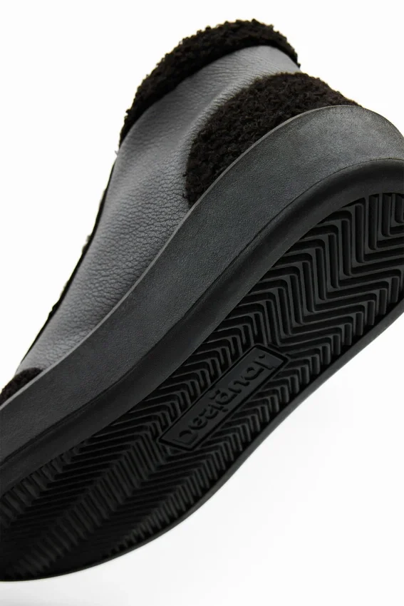 Sneaker alta in finta pelle di montone Sneaker alta in finta pelle di montone