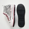 Sneaker alte con plateau e stampa animalier