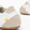 Sneaker in pelle con fibbia