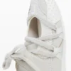 Sneaker in tessuto grezzo