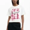 T-shirt con logo a quadri