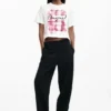 T-shirt con logo a quadri