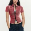 T-shirt iridescente con zip