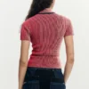 T-shirt iridescente con zip