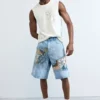 Top con spalline sottili ricamato Top con spalline sottili ricamato