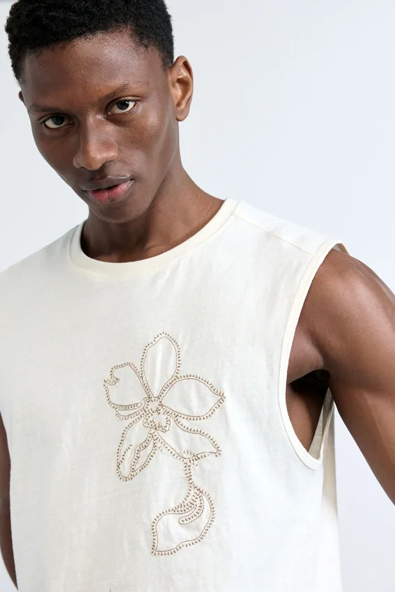 Top con spalline sottili ricamato Top con spalline sottili ricamato