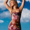 Vestito con fiori in paillettes Vestito con fiori in paillettes