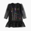Vestito con maniche a 3/4 e scritte Vestito con maniche a 3/4 e scritte