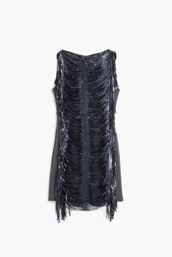 Vestito con paillettes e frange Vestito con paillettes e frange