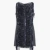 Vestito con paillettes e frange Vestito con paillettes e frange