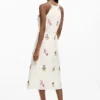 Vestito con scollo all’americana ricamato
