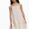 Vestito con spalline e pompon