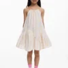 Vestito con spalline e pompon