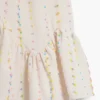 Vestito con spalline e pompon