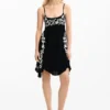 Vestito con spalline fluide ricamato