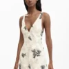 Vestito con spalline ricamate e rami