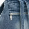 Zaino in denim con ciondoli