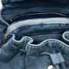 Zaino in denim con ciondoli