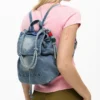 Zaino in denim con ciondoli