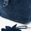 Zaino in denim con motivi floreali Zaino in denim con motivi floreali